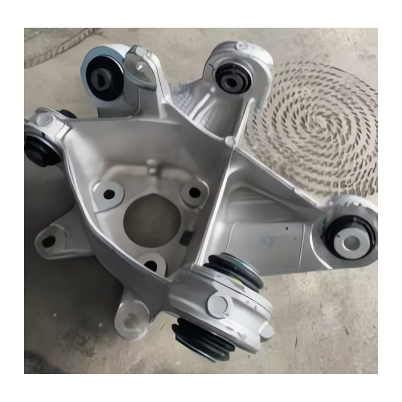 Поворотний кулак задній лівий Tesla Model Y Juniper 2025 2188411-10-B (Оригінал / відновлене) Tesla 2188411-10-B